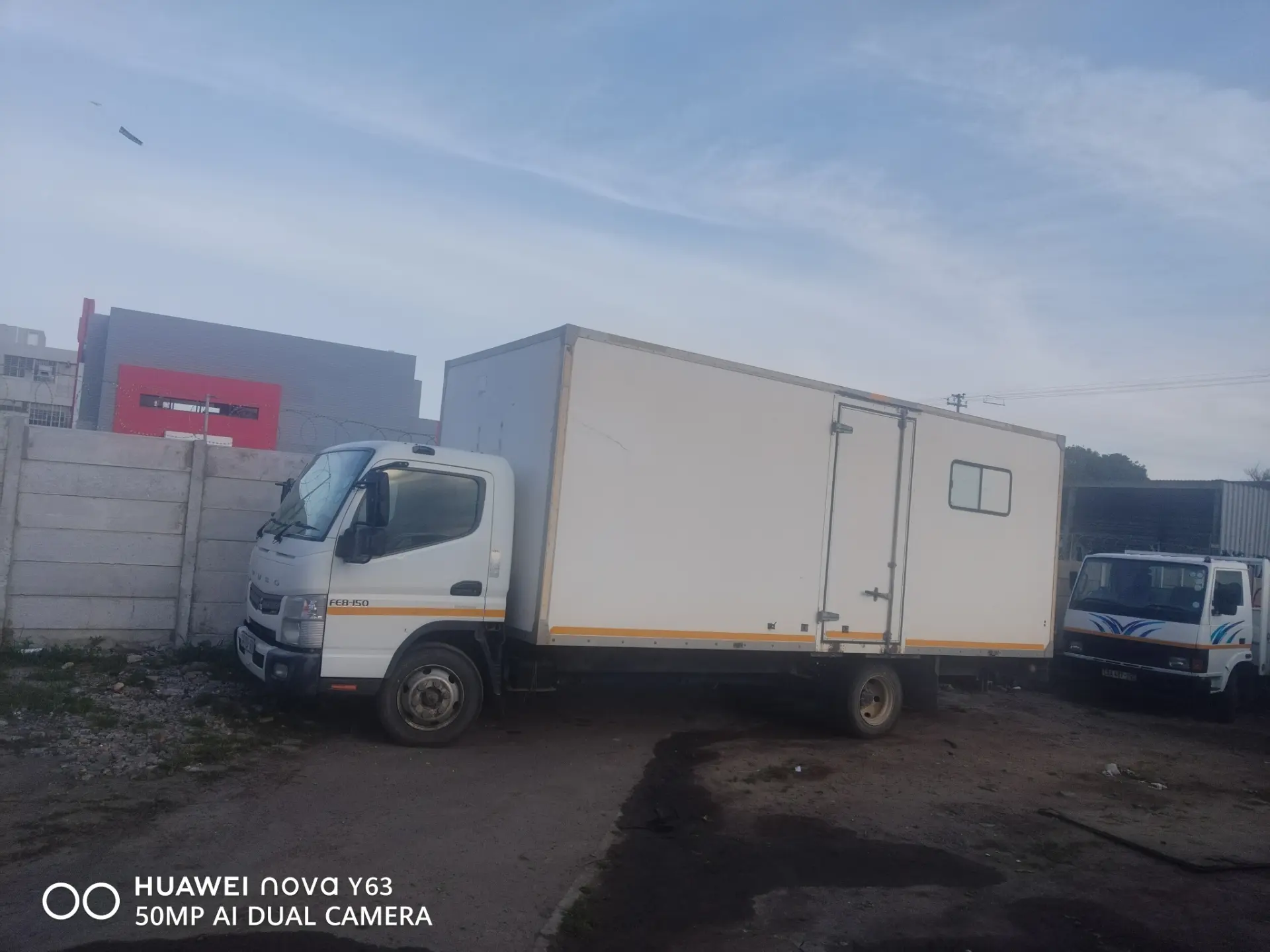 Henry Movers closed-body truck ready for a move